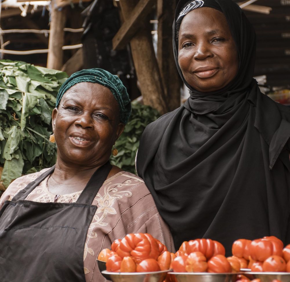 medium-shot-women-posing-market